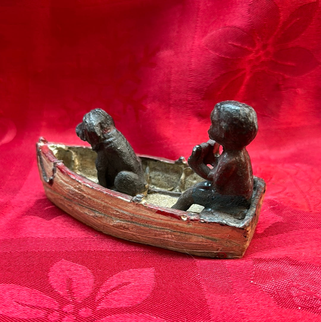 Lead Black Americana Watermelon Boy With Dog in boat