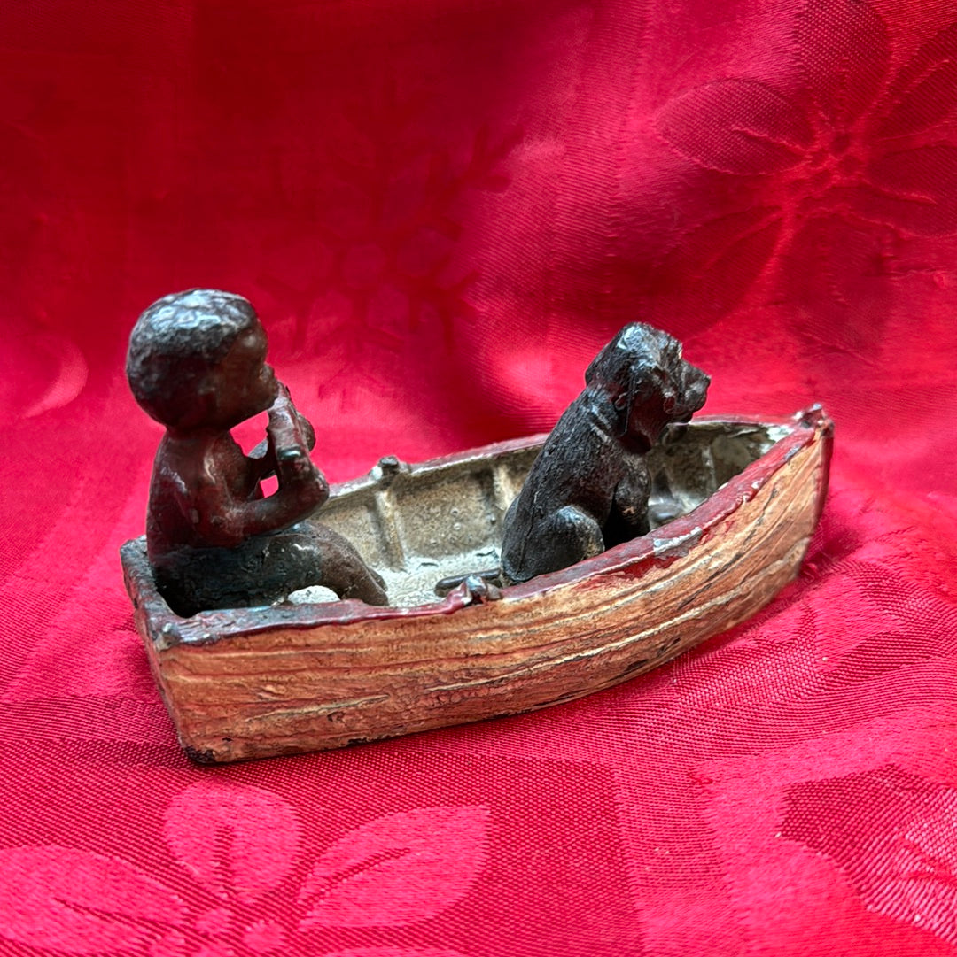 Lead Black Americana Watermelon Boy With Dog in boat