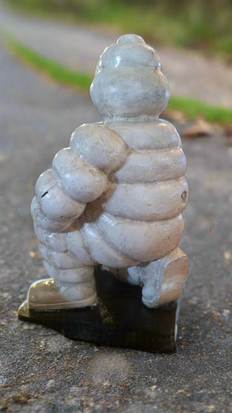 Michelin  Figurine -Cast Iron Michelin Man Kneel w/ Michelin Dog