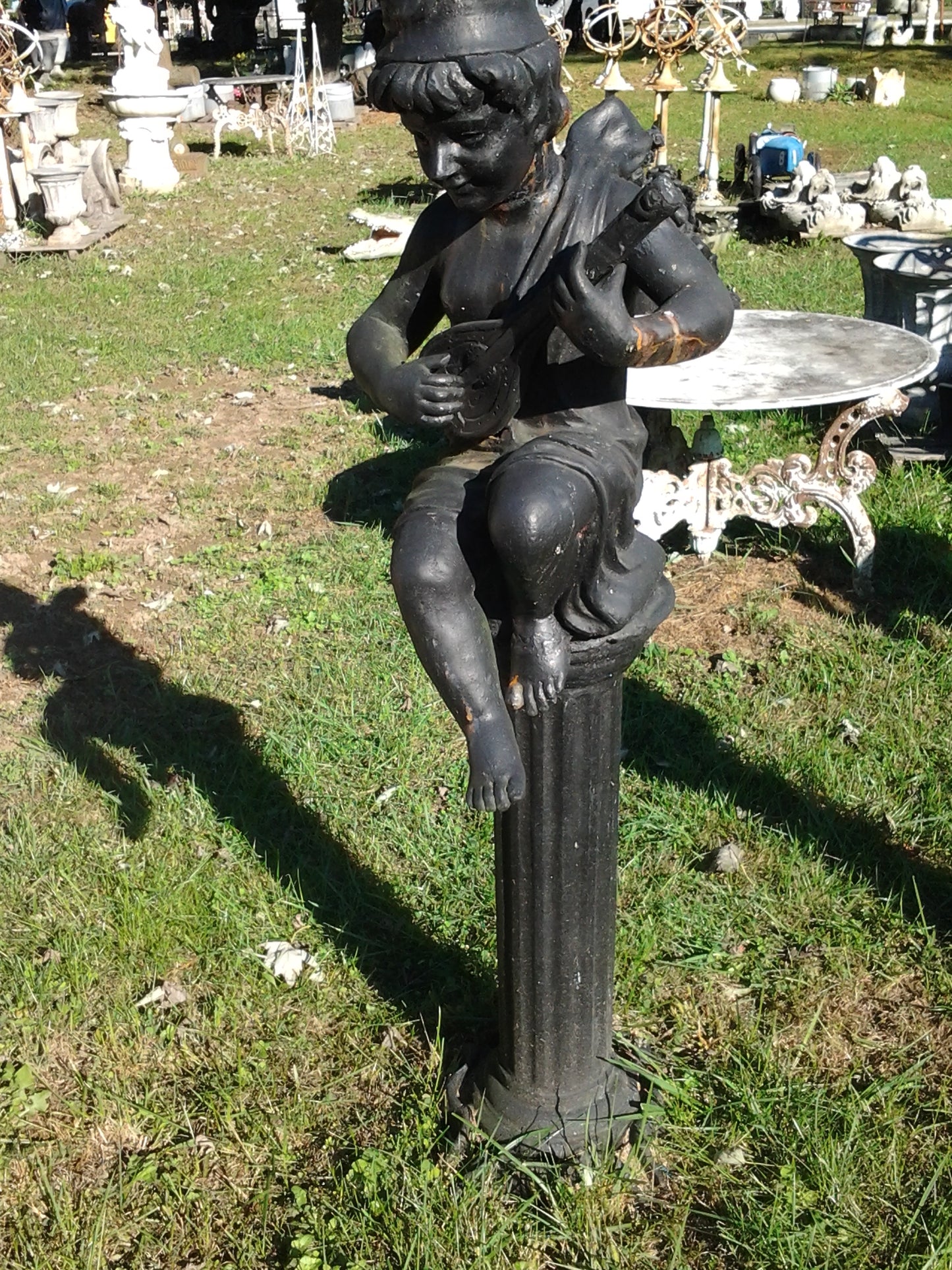 Cast Iron Statue - Pair of Instrumental Child