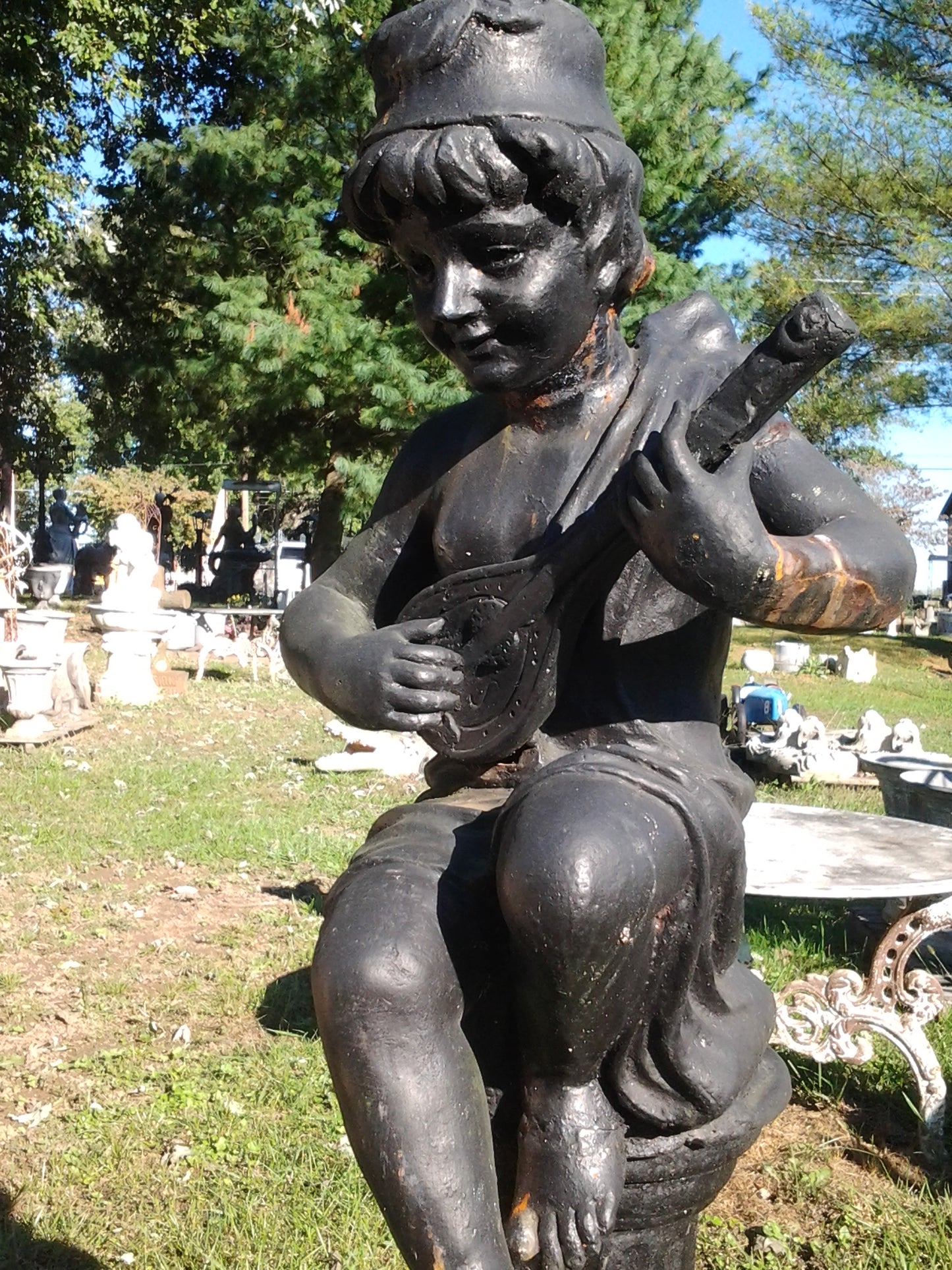 Cast Iron Statue - Pair of Instrumental Child