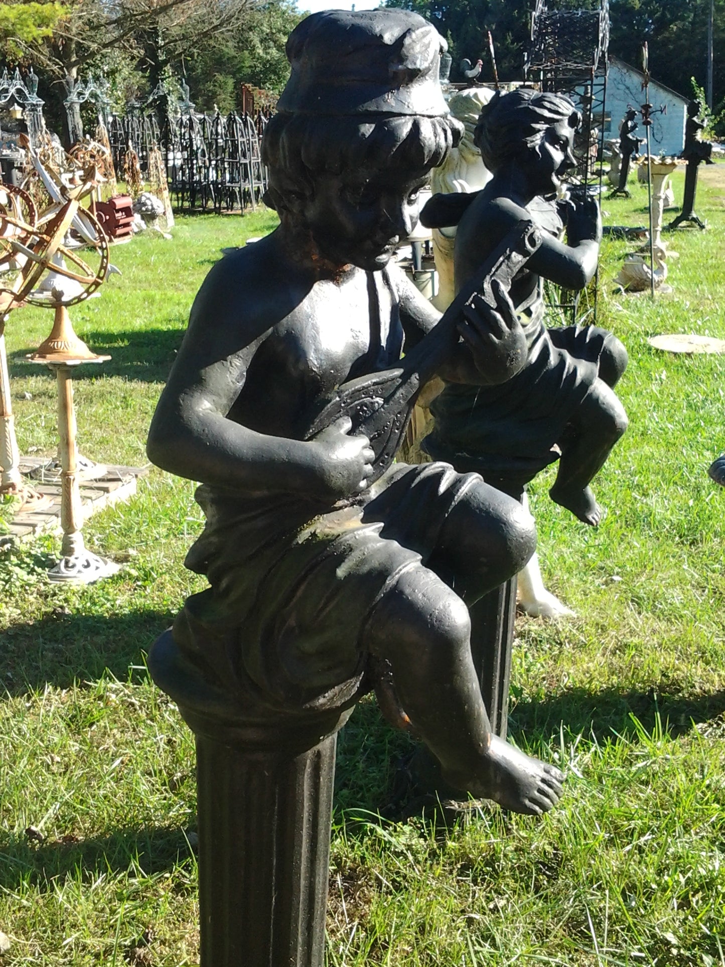 Cast Iron Statue - Pair of Instrumental Child