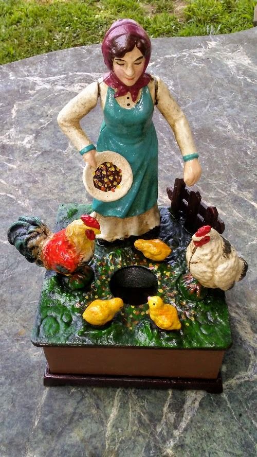 Cast Iron Mechanical Bank - Farm Woman Feeding Chickens Musical