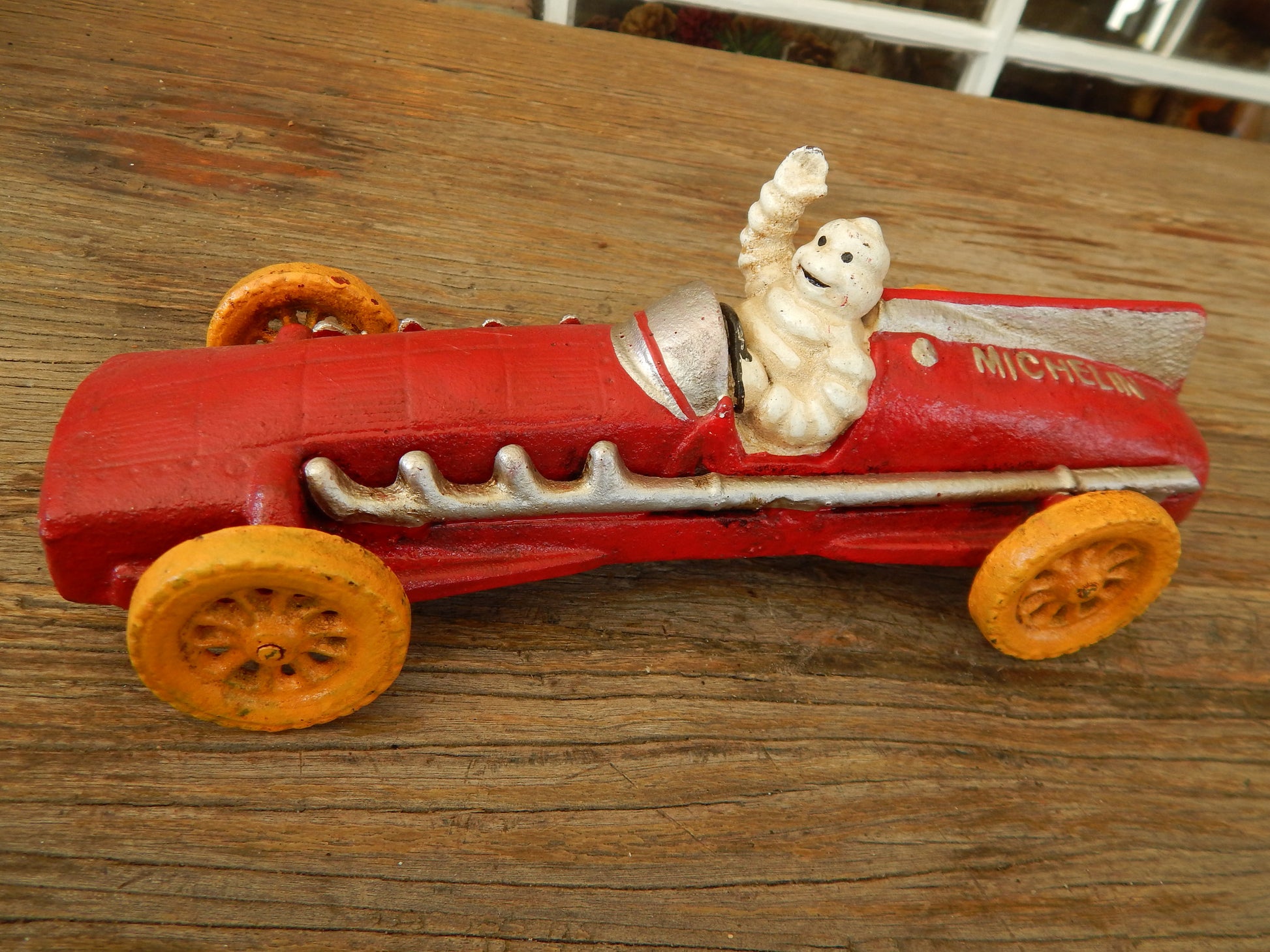 Michelin Figurine - Cast Iron Michelin Tire Advertising Red Race Car Toy-Jantiques LLC.