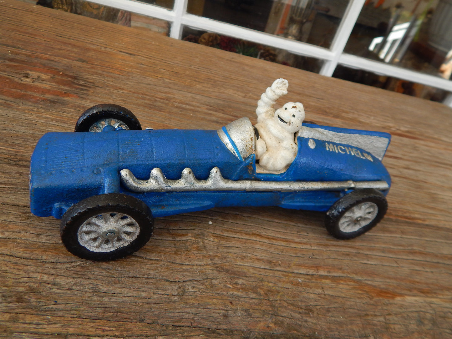 Michelin Figurine -Cast Iron Michelin Tire Advertising Blue Race Car Toy-Jantiques LLC.