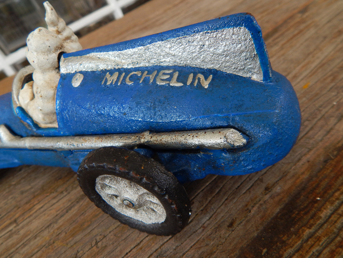 Michelin Figurine -Cast Iron Michelin Tire Advertising Blue Race Car Toy-Jantiques LLC.