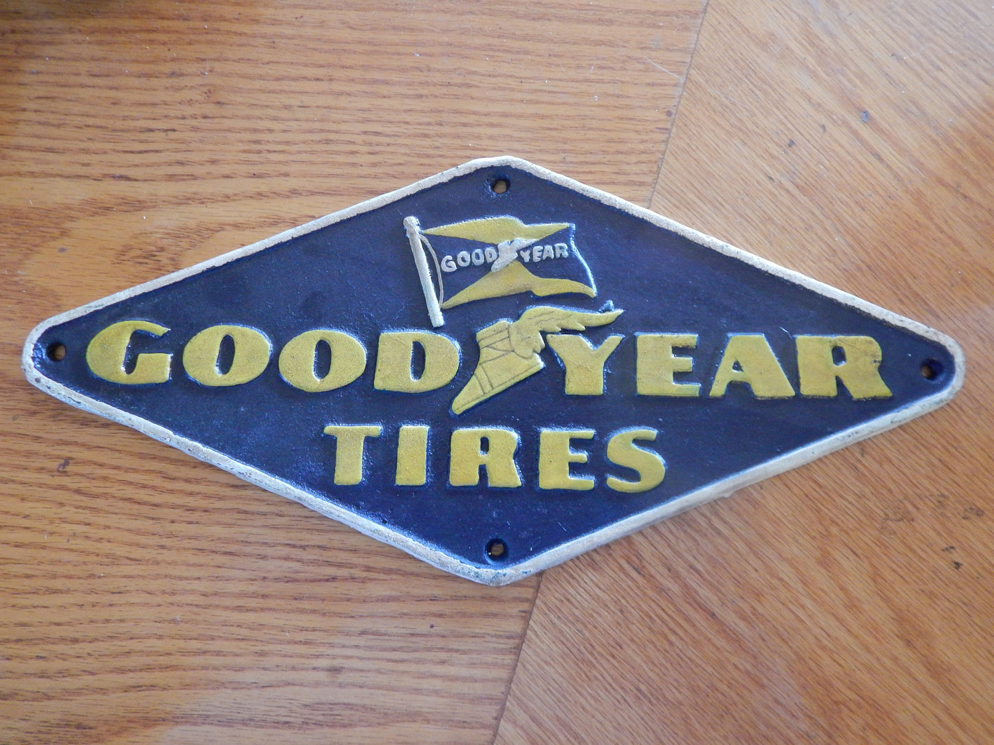 Cast Iron Sign - "GOOD YEAR"