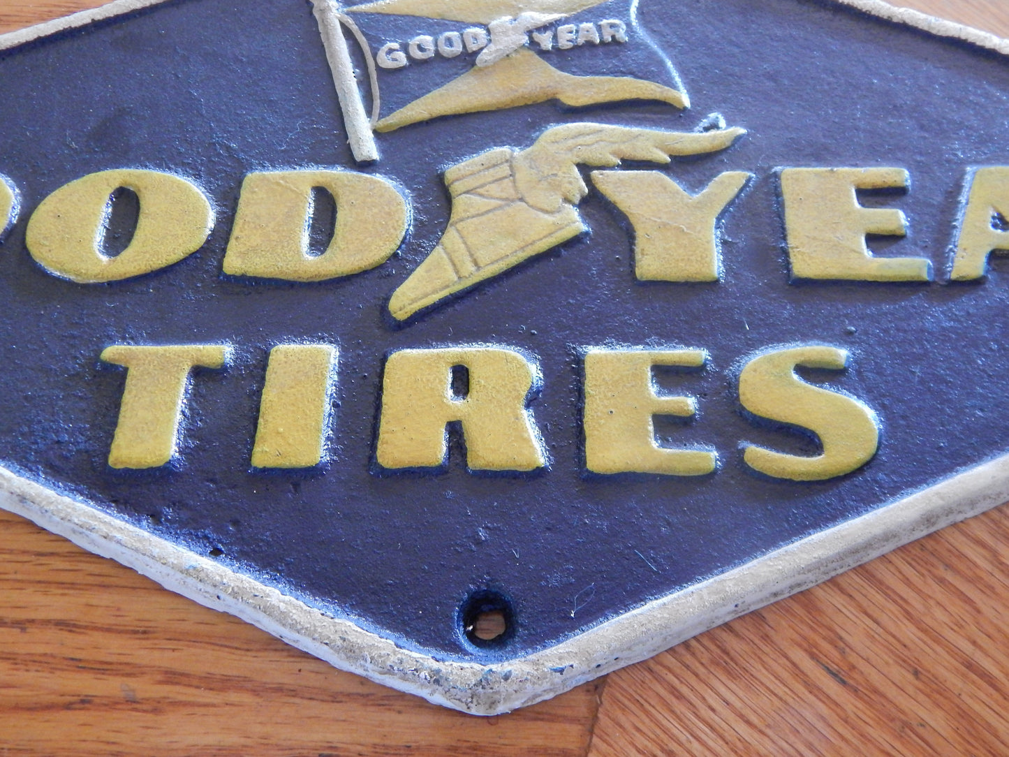 Cast Iron Sign - "GOOD YEAR"