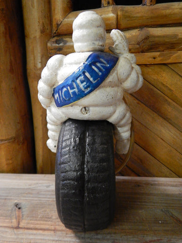 Michelin man Bibendum leaning on tires Figures Object Antique