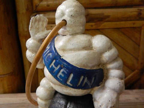 Michelin man Bibendum leaning on tires Figures Object Antique