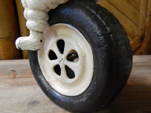 Michelin Figurine -Cast Iron Michelin Man Bibendum on Tire