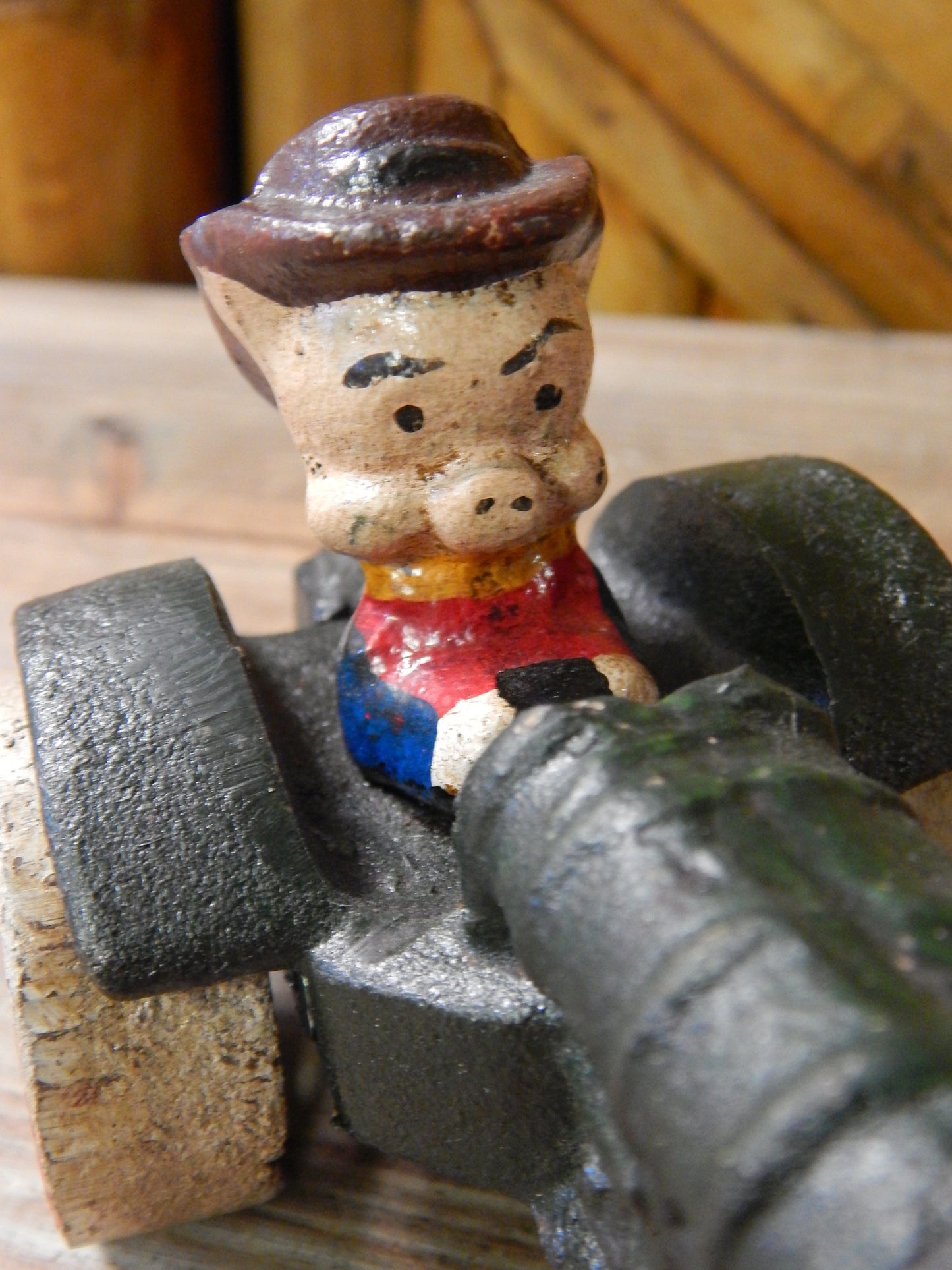 Cast Iron Figurine - Porky Pig on Farm Tractor