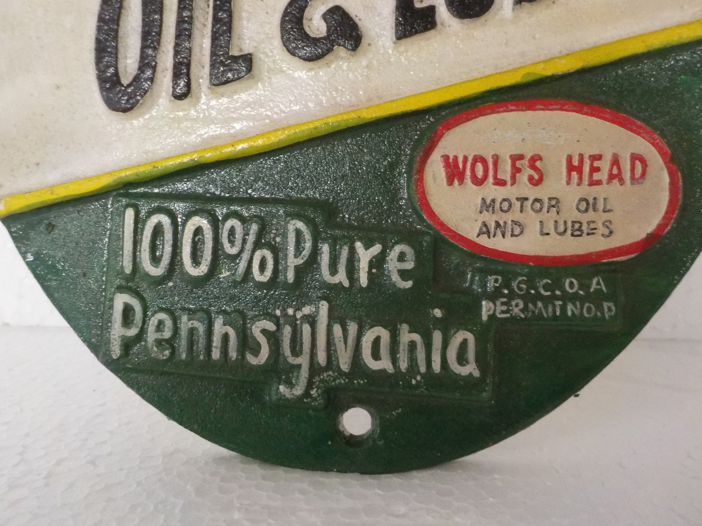 Cast Iron Sign - Automotive "WOLF'S HEAD OIL&LUBE 100% PENNSYLVANIA MOTOR OIL"