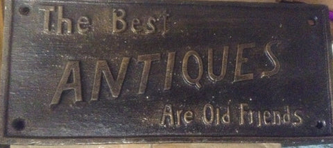 Cast Iron Sign - "The Best Antiques"