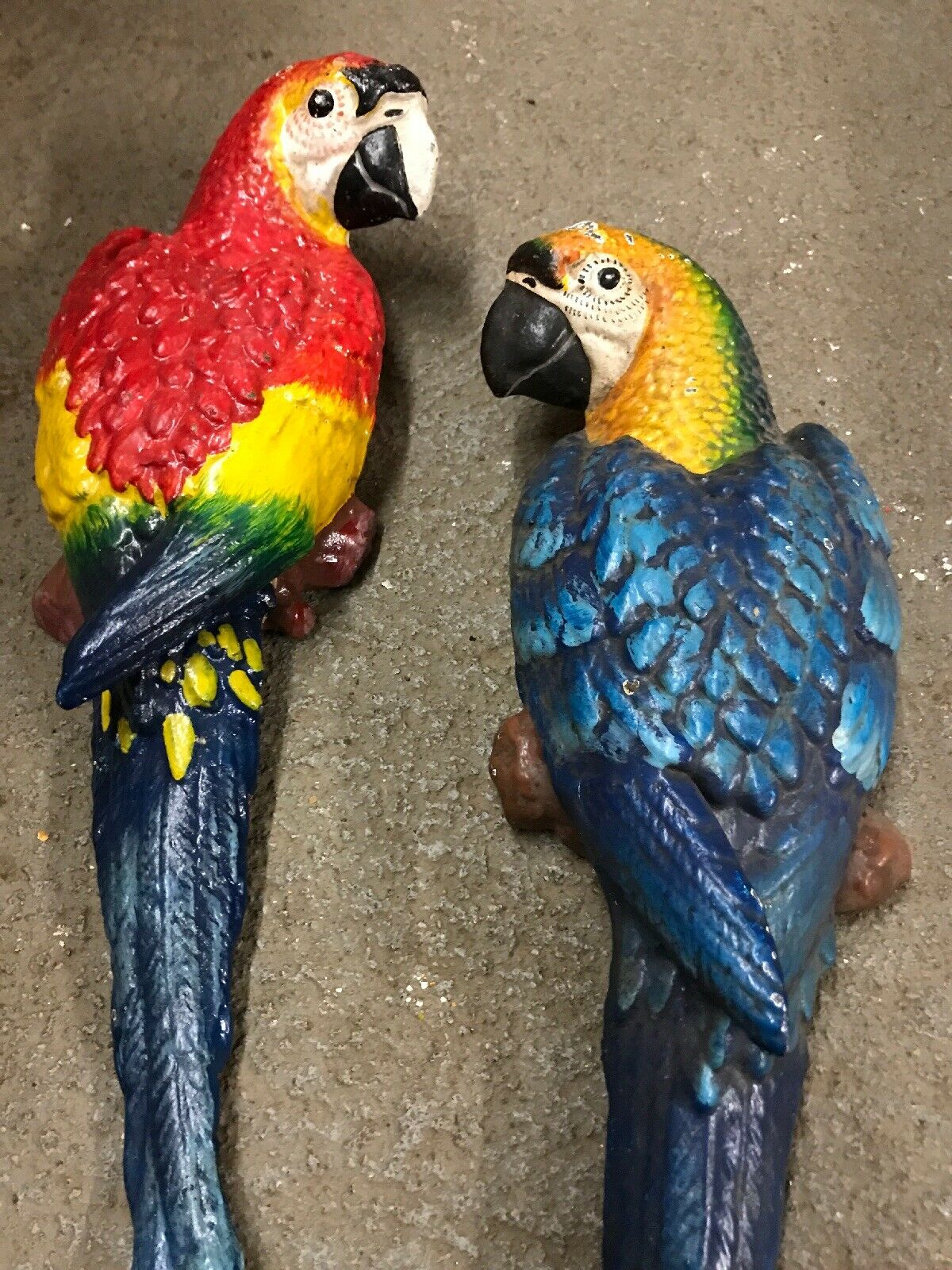 CAST IRON PAIR OF WALL MOUNT BLUE AND RED PARROT